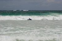 rick paddling just before catching the wave