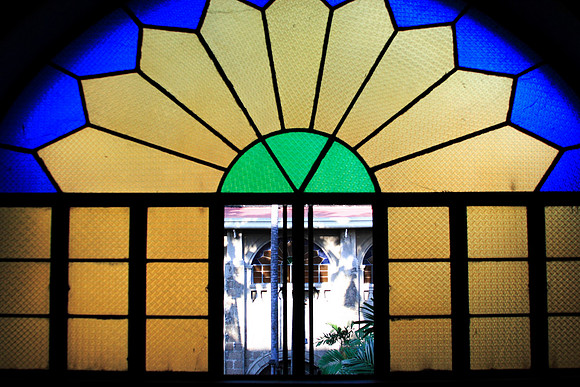 stained glass window inside san augustin church museum
